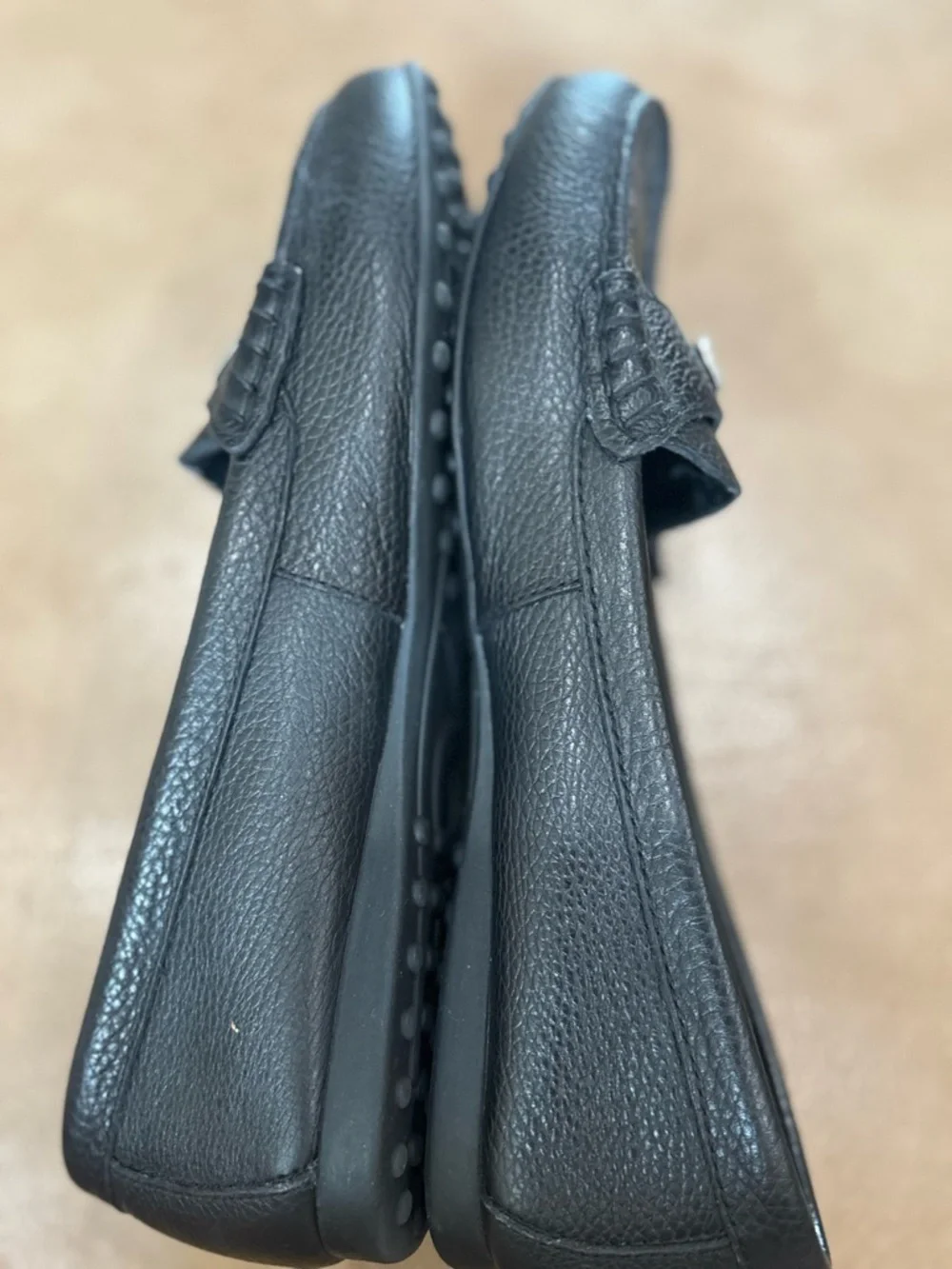 Coach minimalist Black Pebbled Leather Loafers with Silver Plaque